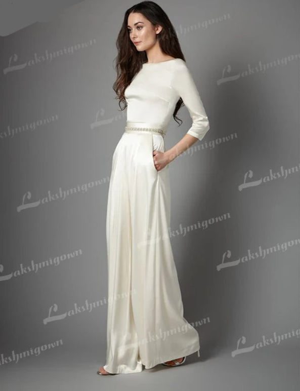 Wedding Jumpsuit Lace Bridal Pants Suit, This sophisticated jumpsuit features a long-sleeve top, wide-leg pants, and a fitted waist sash