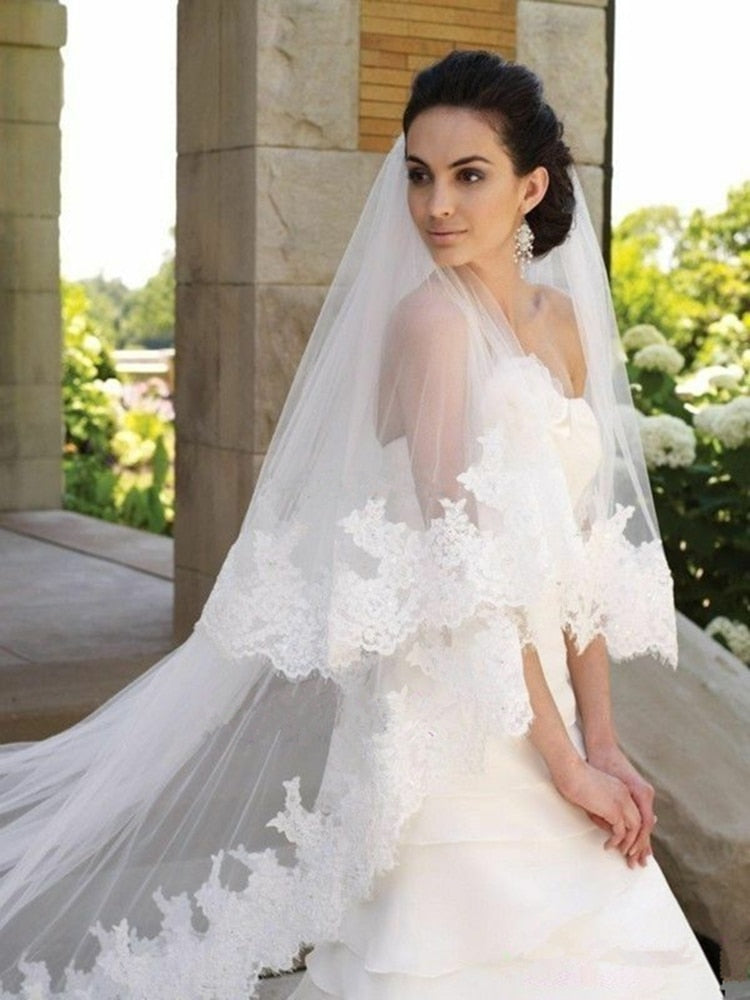 Ivory wedding dress with white veil best sale