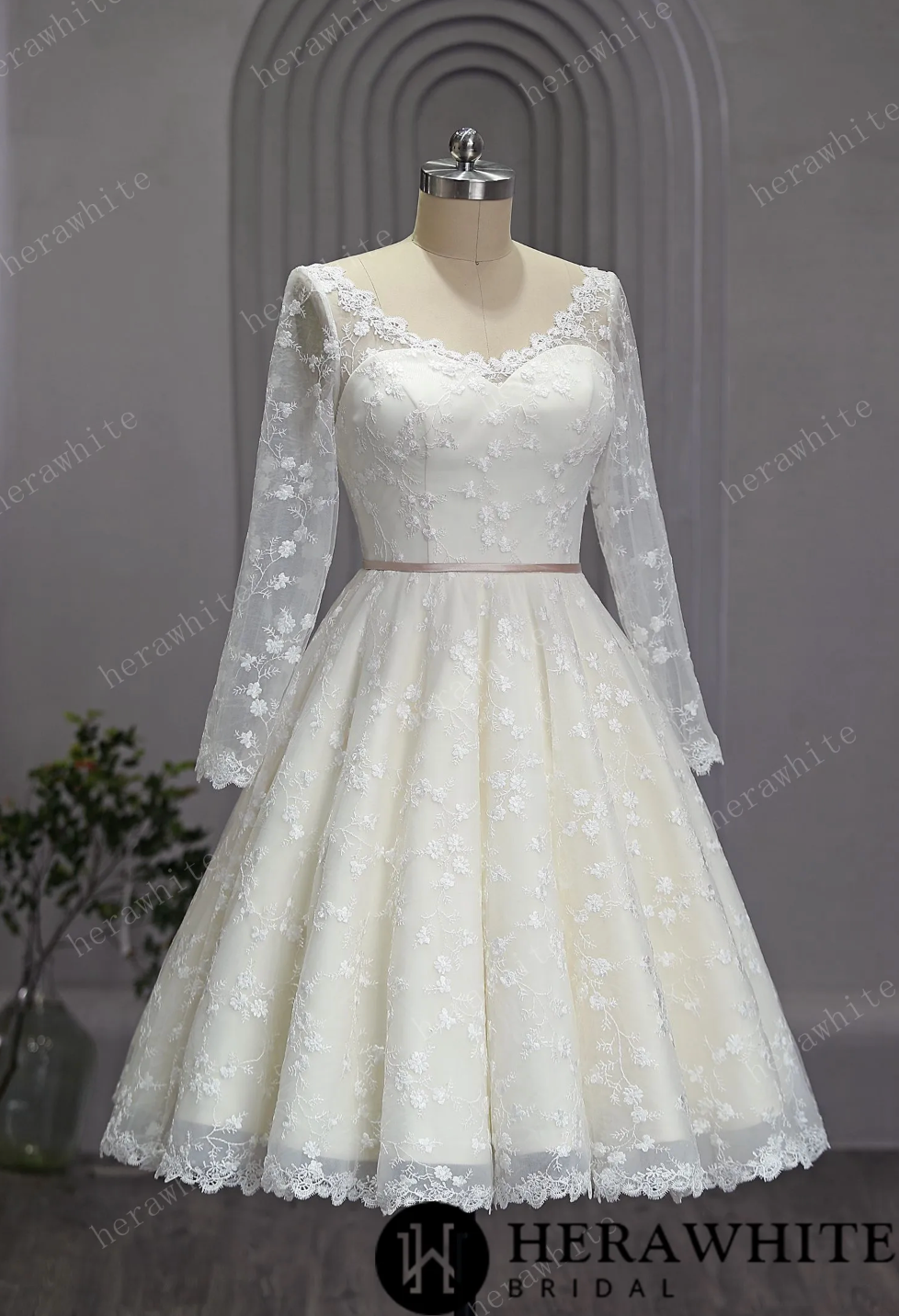 Mini Short Wedding Dress Lace Long Sleeves Tea Length, This dress is a perfect choice for a garden wedding. The vintage lace design adds a touch of elegance