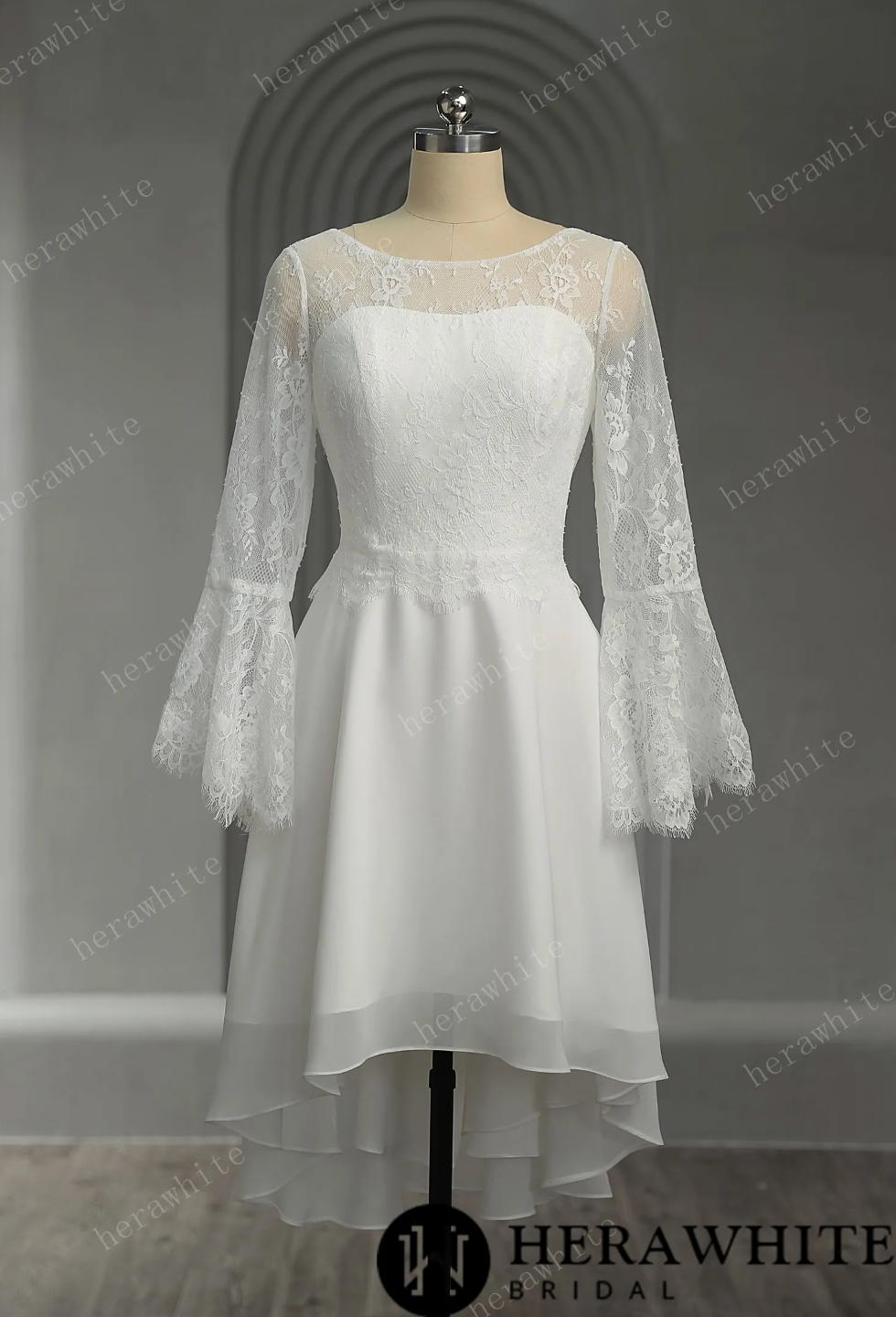 Mini Short Wedding Dress Lace Illusion Trumpet Long Sleeves, The silk chiffon fabric gives the dress a luxurious and silky appearance, while the lace adds a d
