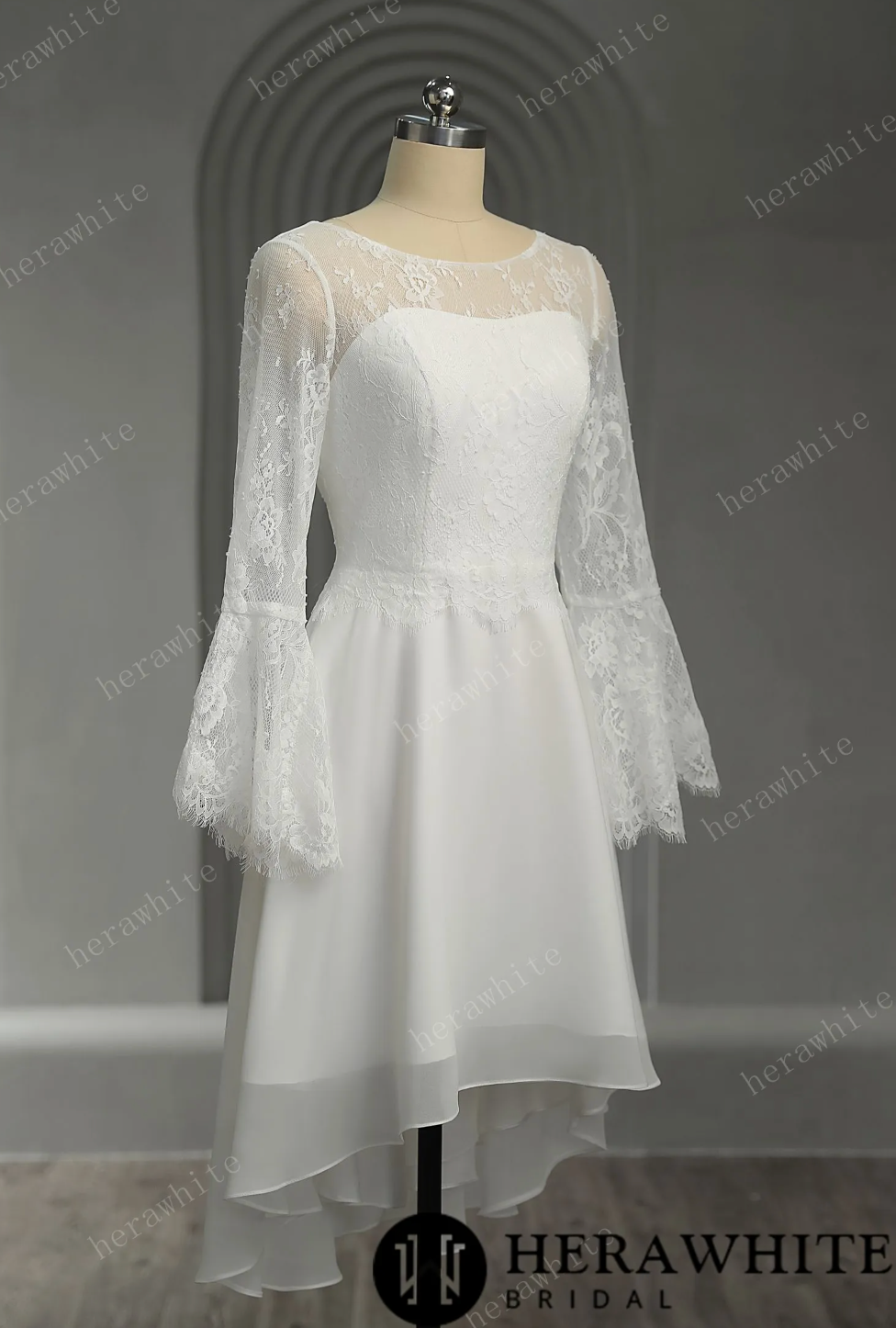 Mini Short Wedding Dress Lace Illusion Trumpet Long Sleeves, The silk chiffon fabric gives the dress a luxurious and silky appearance, while the lace adds a d