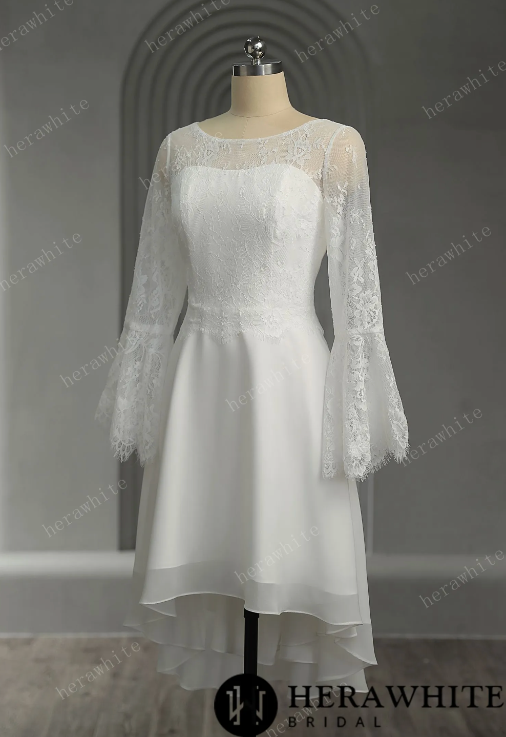 Mini Short Wedding Dress Lace Illusion Trumpet Long Sleeves, The silk chiffon fabric gives the dress a luxurious and silky appearance, while the lace adds a d