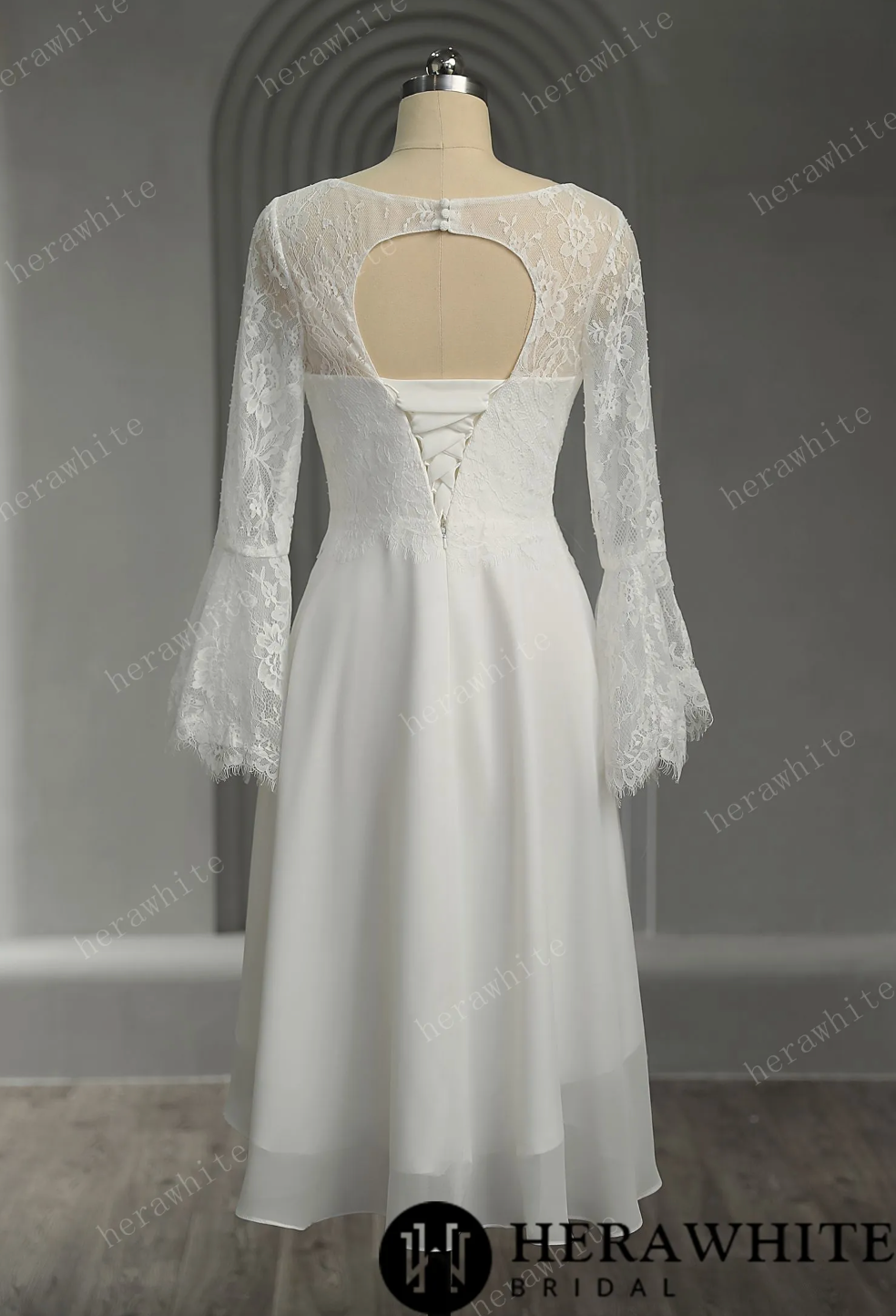 Mini Short Wedding Dress Lace Illusion Trumpet Long Sleeves, The silk chiffon fabric gives the dress a luxurious and silky appearance, while the lace adds a d