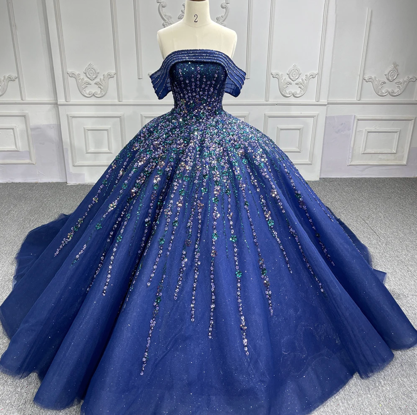 Quinceanera Dress Blue Organza Ball Gown With Train, Embody luxury and grace in this stunning blue ball gown Quinceanera dress. The heavily beaded bodice