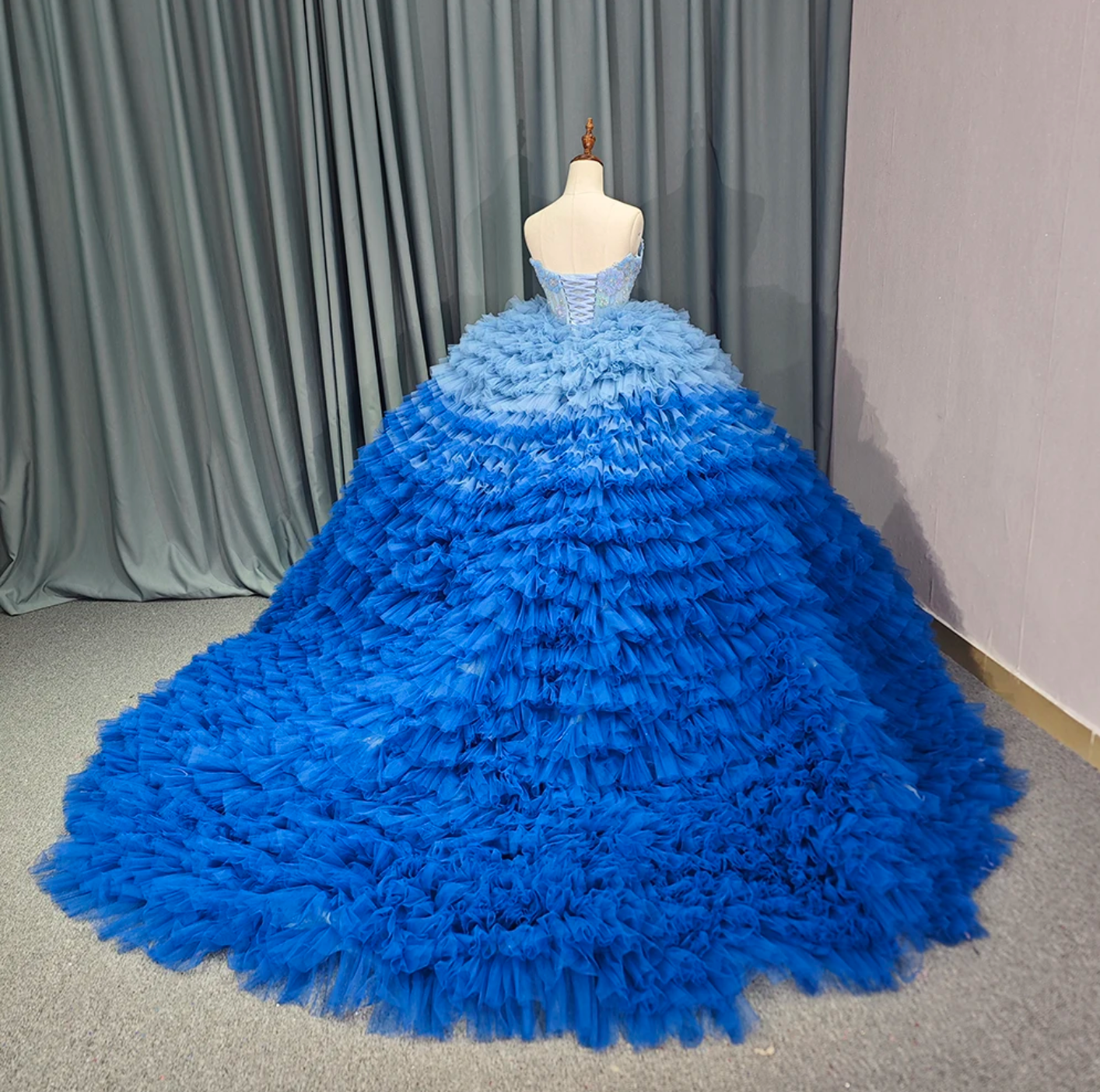 Quinceanera Dress Blue Tulle Ball Gown With Train, Indulge in the luxurious elegance of our Blue Ruffle Quinceanera Dress. The unique ombre design