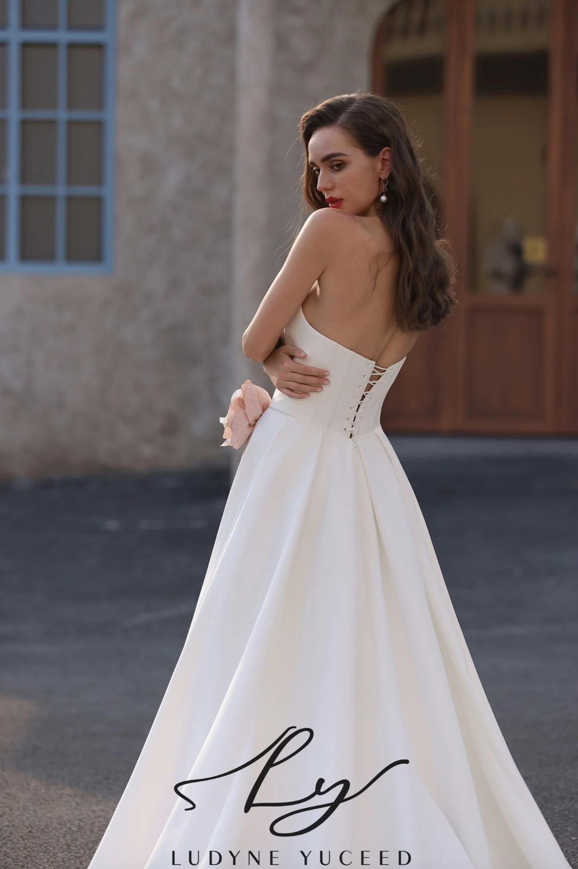 Wedding Dress Strapless Satin Floral Accent Bridal Gown, this elegant strapless satin wedding dress showcases a graceful scoop neckline and a