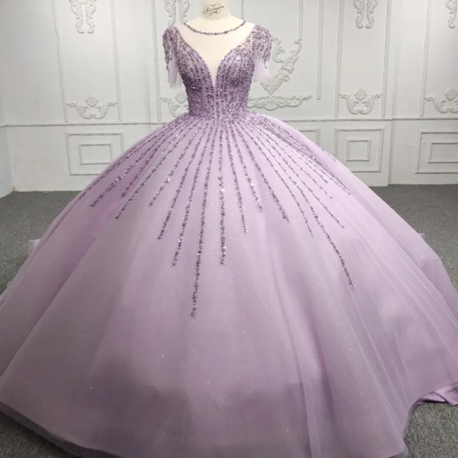 Purple sequined A-line party ball gown with plunging V-neck and illusion scoop neck for a stunning evening look.