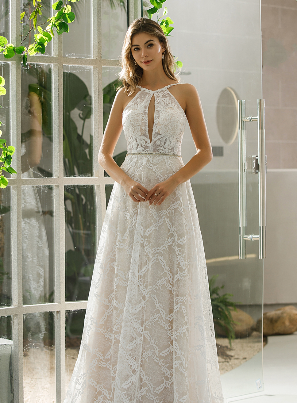 Wedding Dress Halter Neckline Lace Crisscross Back Gown, A sophisticated halter neck gown with a sensual front split, floral lace adorns the neck.