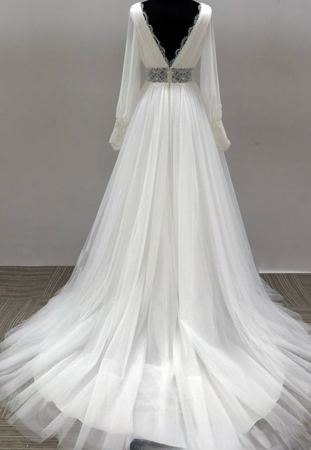 Swiss Tulle Wedding Dress Satin A Line Bridal Gown, this beautiful A-line wedding dress features a plunging V-neckline and low V back with scalloped trim.