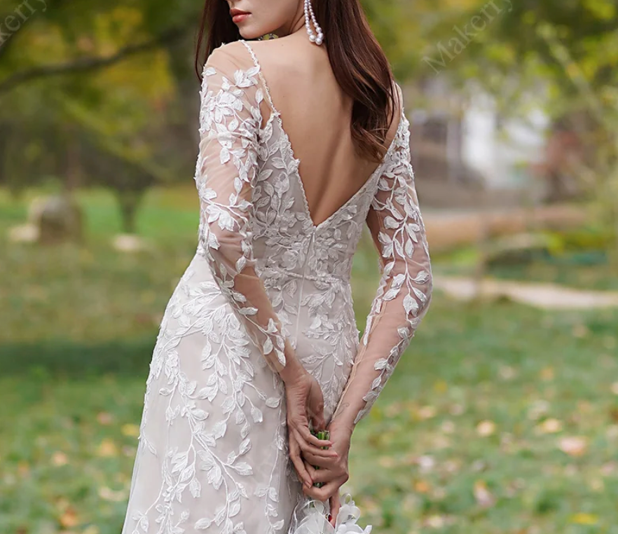 Wedding Dress 3D Lace Hand Beaded Bridal Gown With Sleeves, This gown is adorned with romantic details, featuring a plunging demi-sheer illusion neckline