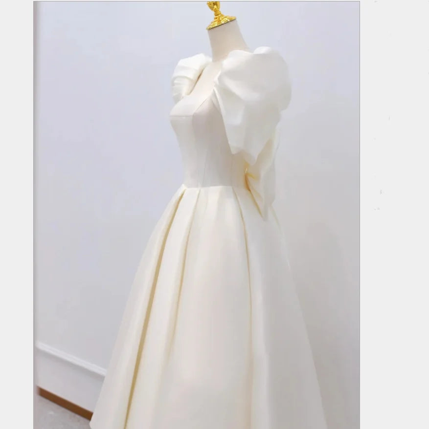 
                      
                        Simple Satin Wedding Dress Tea length Puffy Sleeves With Big Bow
                      
                    