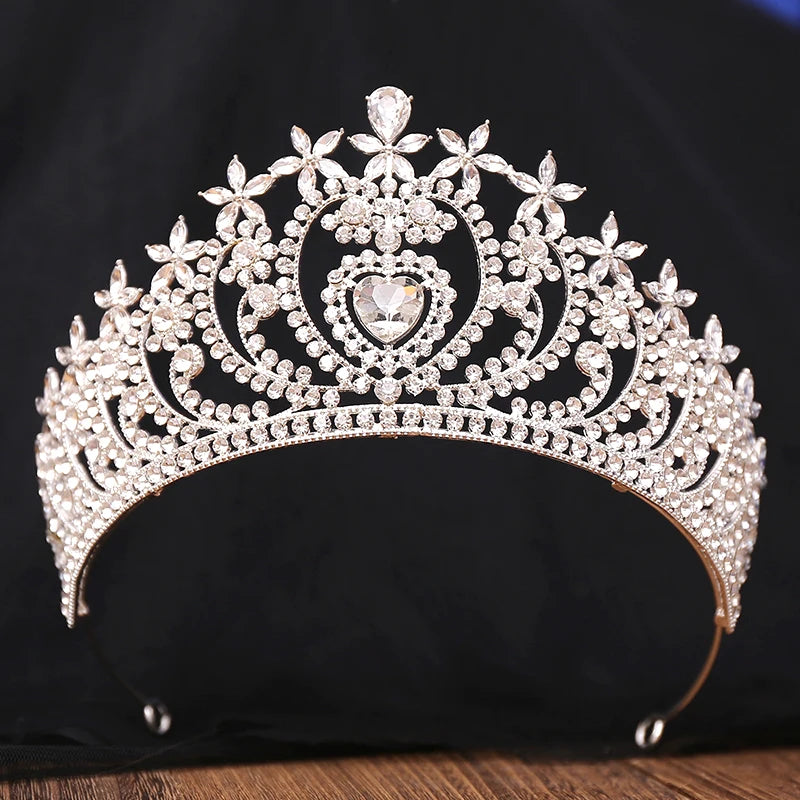 
                      
                        Ornate tiara with crystals on a black background
                      
                    