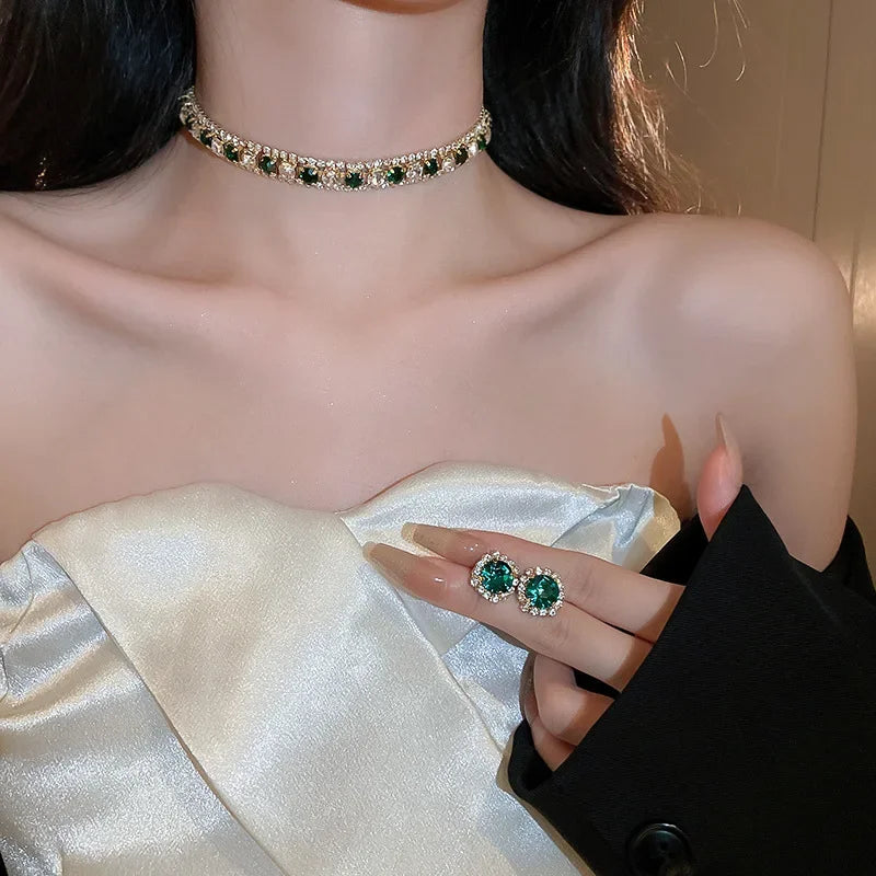 
                      
                        Crystal Jewelry set with necklace and earrings on a light background
                      
                    