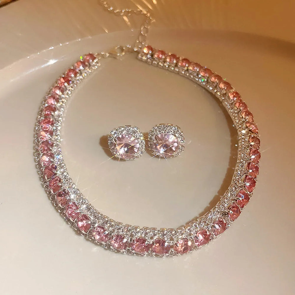 
                      
                        Crystal Jewelry set with necklace and earrings on a light background
                      
                    