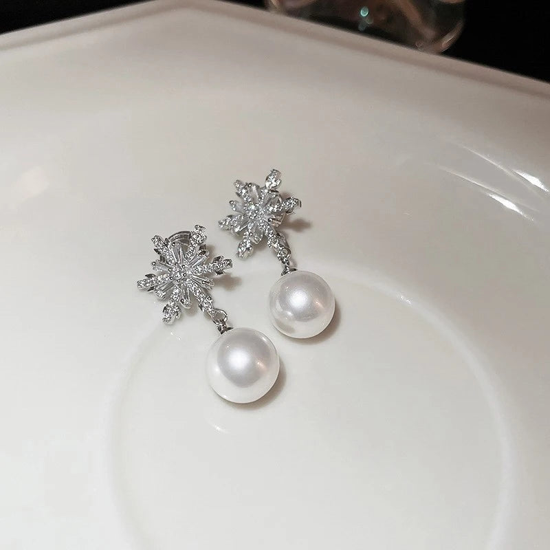 
                      
                        Snowflake Shaped Dangle Earrings with Imitation Pearl for Women Fashion Jewelry
                      
                    