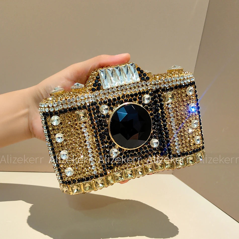 
                      
                        Novelty Crystal Camera Clutch Purse  Evening Boutique Metallic Purse, capture attention in this exquisite camera-shaped evening clutch
                      
                    