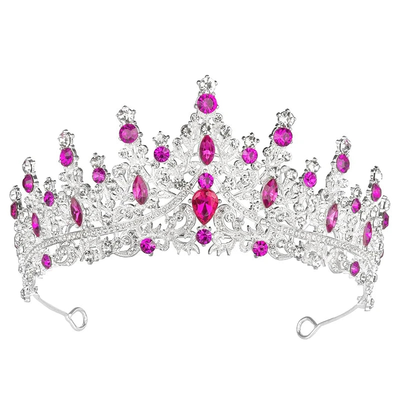 Silver tiara with pink gemstones on a white background