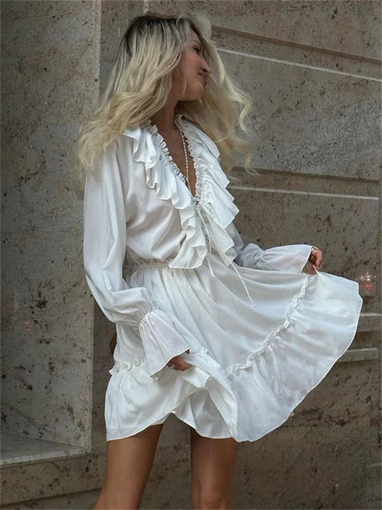 
                      
                        Ruffled V-Neck White Mini Dress
                      
                    