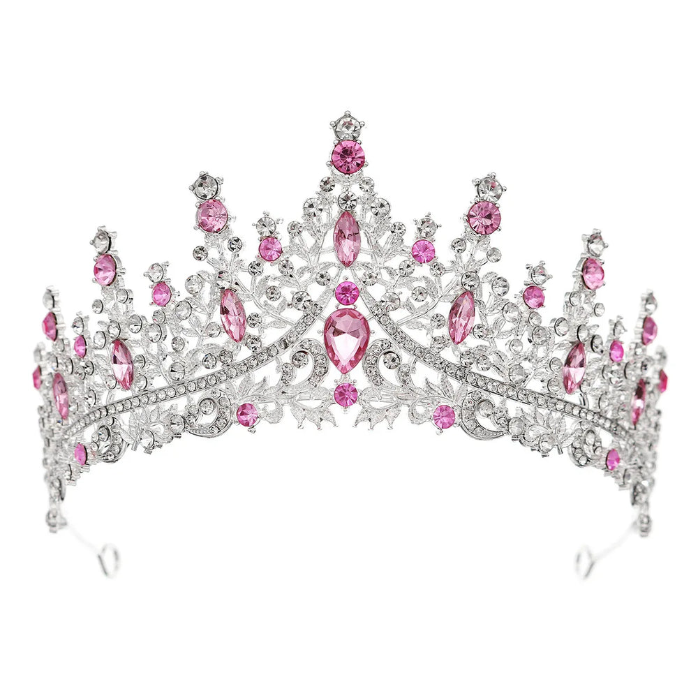 
                      
                        Elegant tiara with pink gemstones on a white background
                      
                    