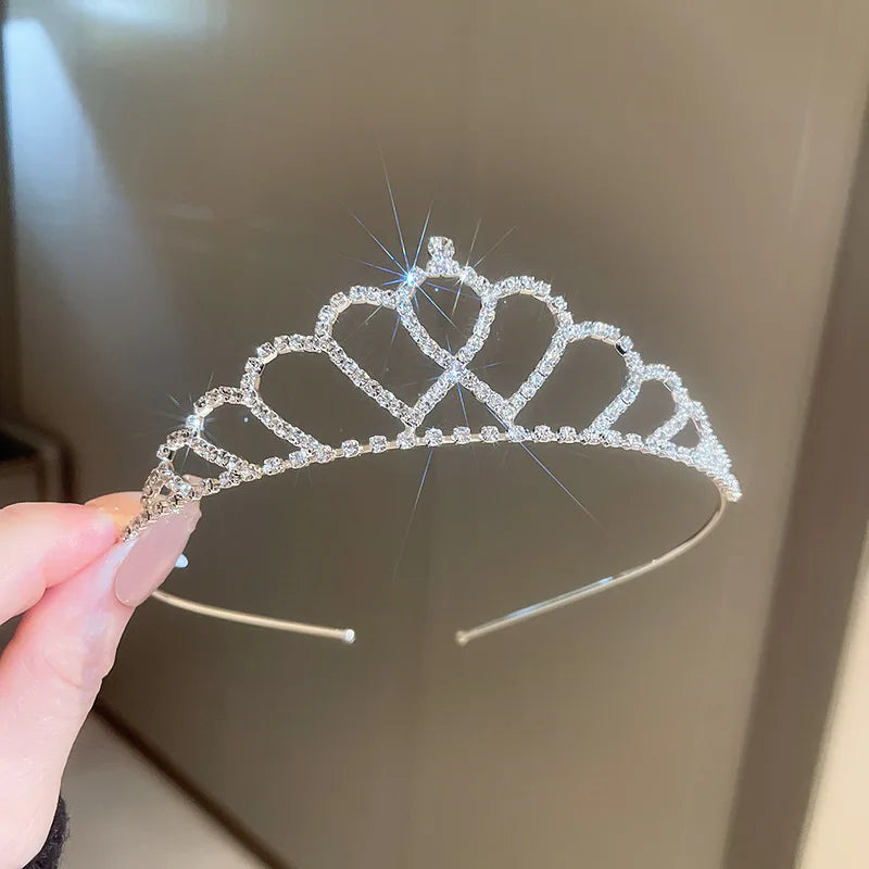 
                      
                        Girls princess tiara crowns in a variety of styles, crystal tiaras on metal frame, pageant, prom, party events.
                      
                    