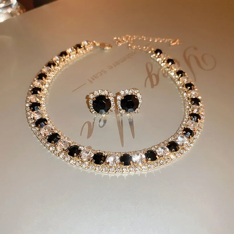 
                      
                        Crystal Jewelry set with necklace and earrings on a light background
                      
                    
