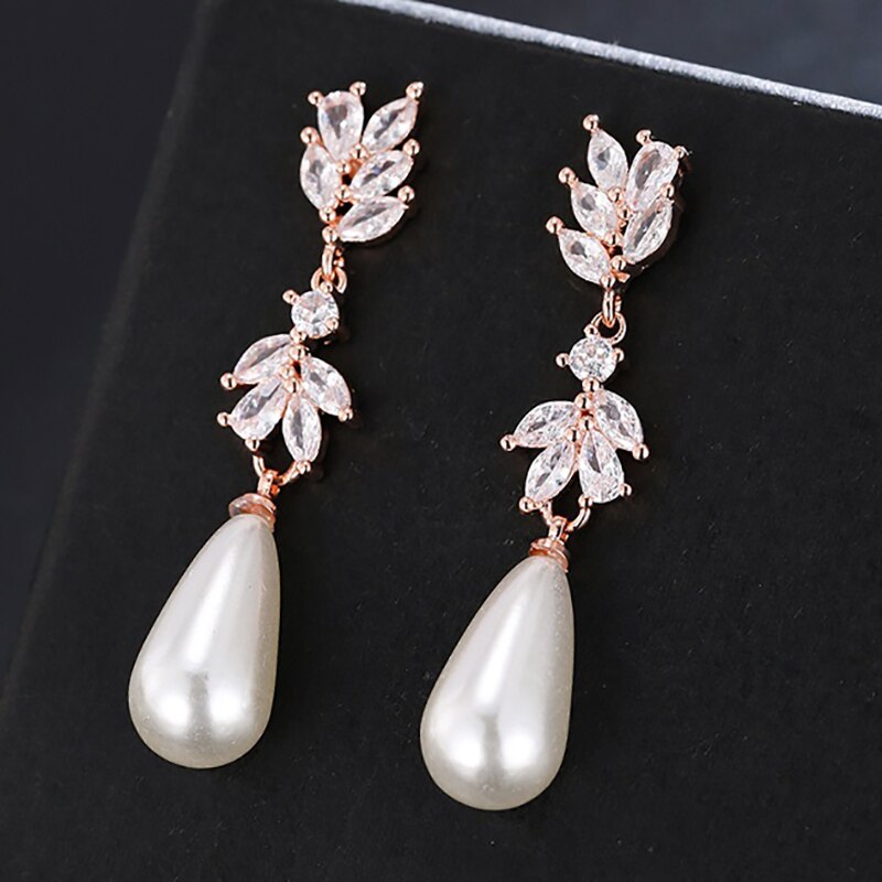 
                      
                        Fashion Imitation Pearl Drop Cubic Zirconia Wedding Earrings
                      
                    