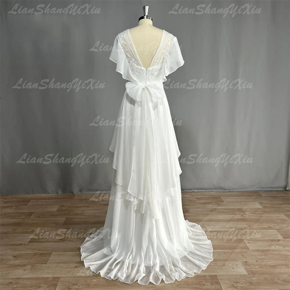 
                      
                        Boho Ruffle V-Neck Wedding Dress Chiffon A Line Short Sleeve Backless Beach Bridal Gown
                      
                    