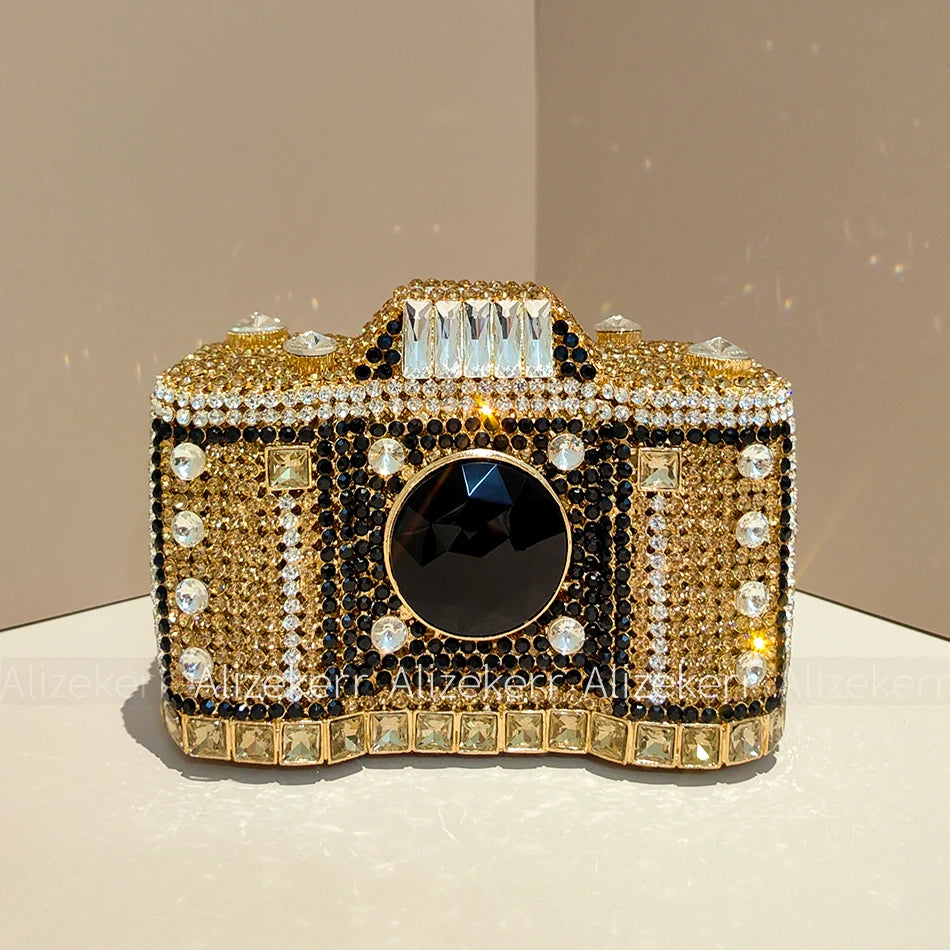 
                      
                        Novelty Crystal Camera Clutch Purse  Evening Boutique Metallic Purse, capture attention in this exquisite camera-shaped evening clutch
                      
                    