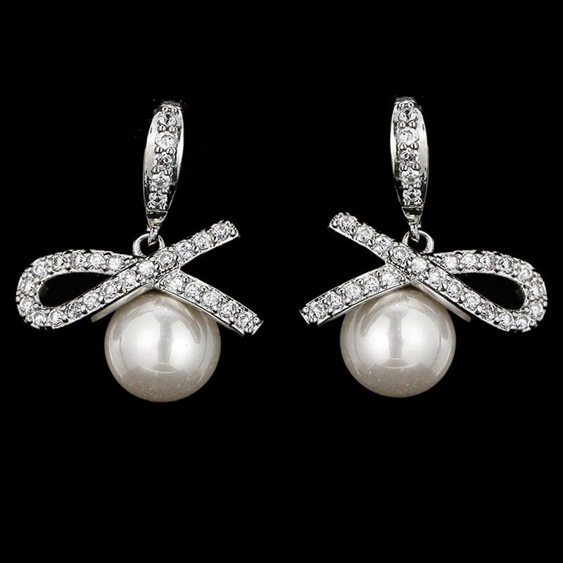 
                      
                        Fashion Imitation Pearl Drop Cubic Zirconia Wedding Earrings
                      
                    