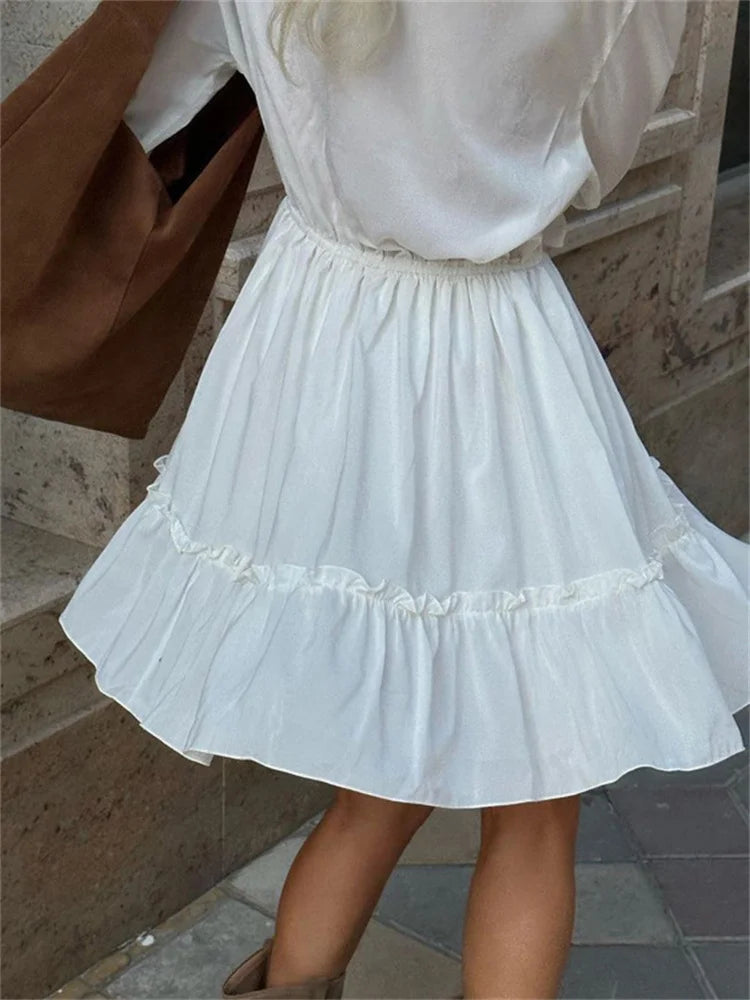 
                      
                        Ruffled V-Neck White Mini Dress
                      
                    