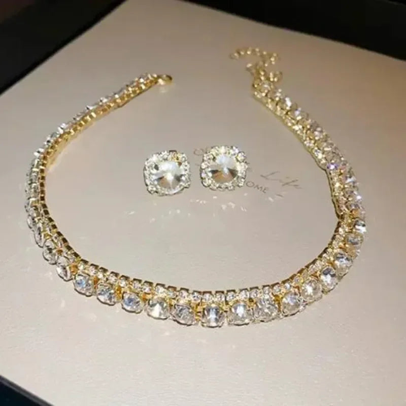 
                      
                        Crystal Jewelry set with necklace and earrings on a light background
                      
                    