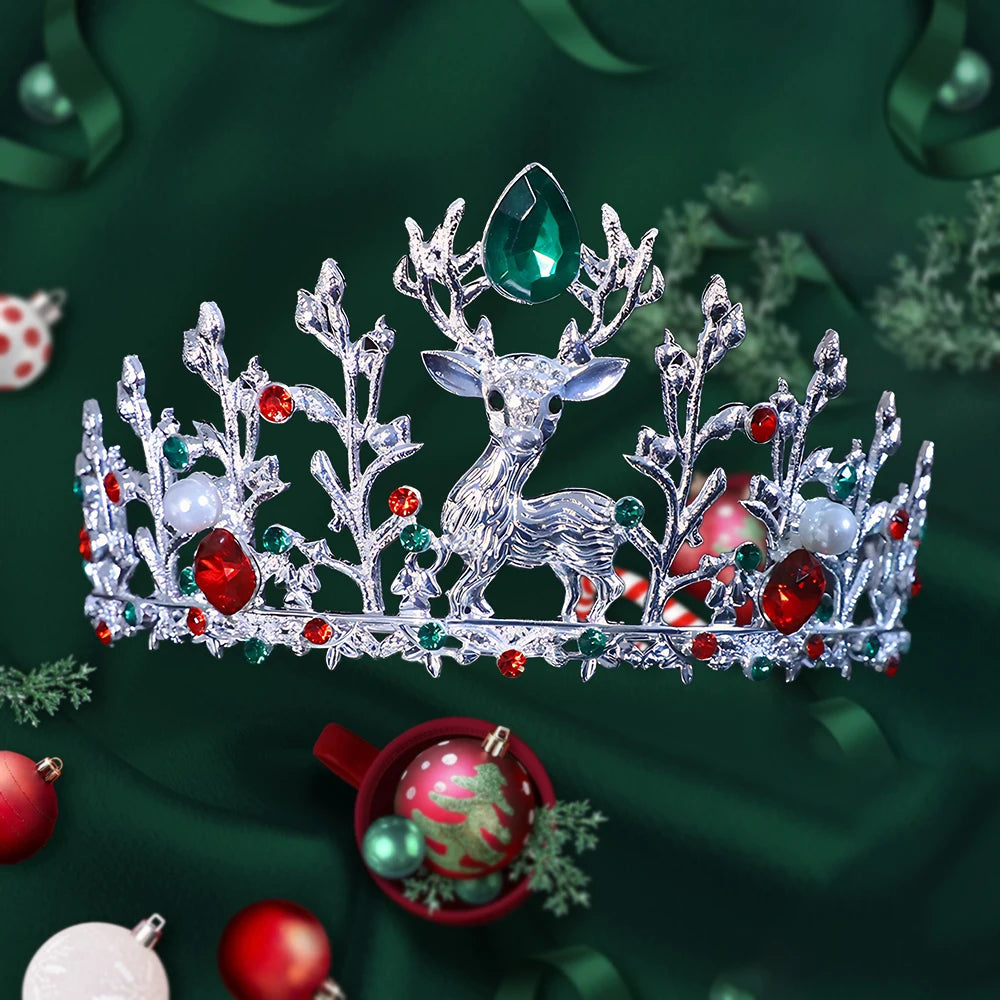 
                      
                        Decorative tiara with reindeer design on a green background with Christmas ornaments.
                      
                    