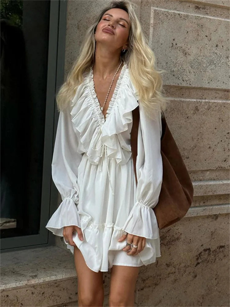 
                      
                        Ruffled V-Neck White Mini Dress
                      
                    