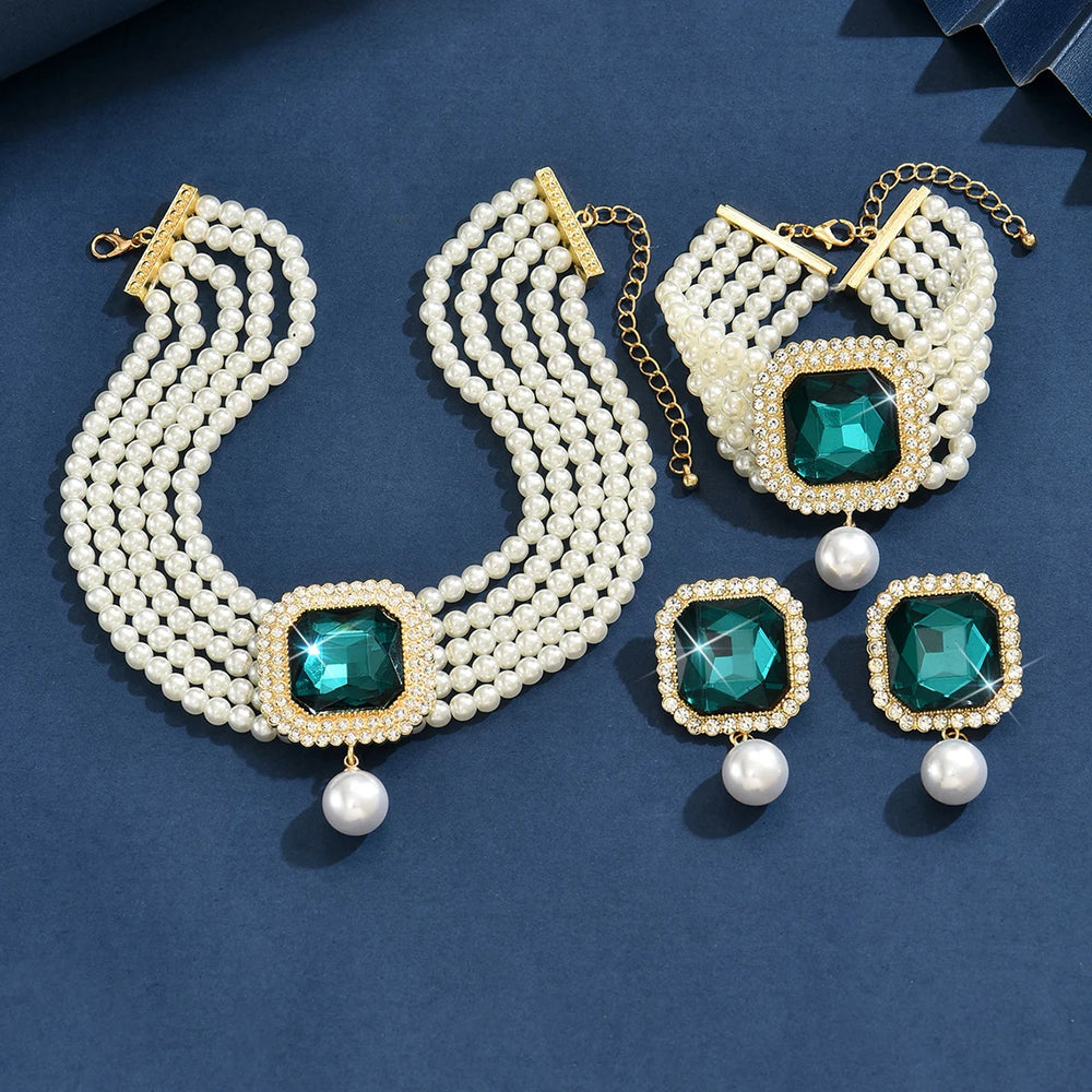 
                      
                        Pearl and emerald green gemstone jewelry set 
                      
                    