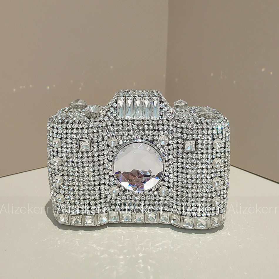 
                      
                        Novelty Crystal Camera Clutch Purse  Evening Boutique Metallic Purse, capture attention in this exquisite camera-shaped evening clutch
                      
                    