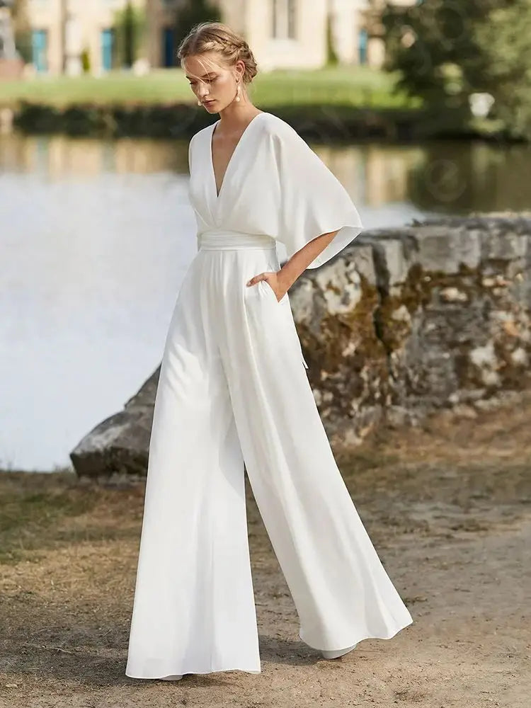 
                      
                        White Jumpsuit Wedding Dress V Neckline Boho Beach Bridal Pants Suit
                      
                    