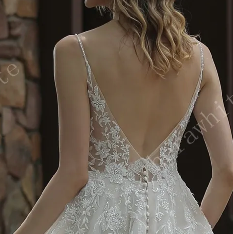 
                      
                        Sparkly A-Line Wedding Dress with Beaded Spaghetti Straps
                      
                    