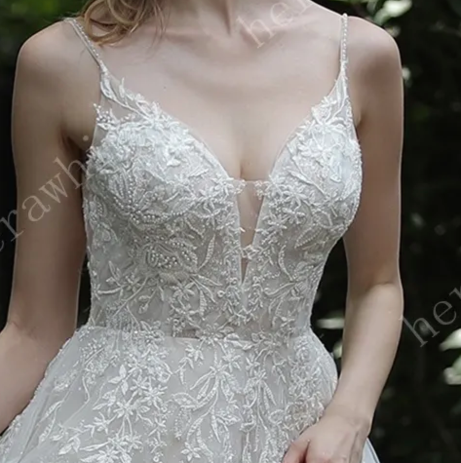 
                      
                        Sparkly A-Line Wedding Dress with Beaded Spaghetti Straps
                      
                    