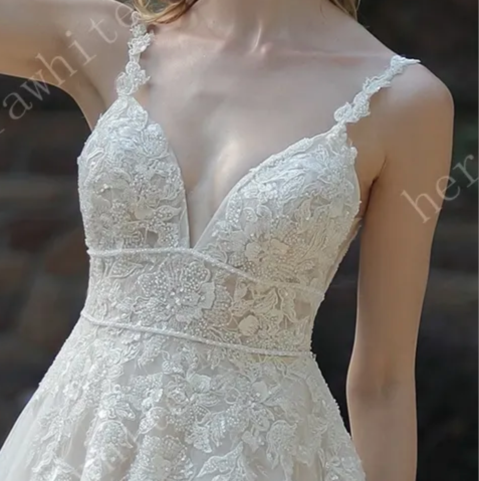 
                      
                        Plunging Sweetheart Beaded Wedding Dress with Double Band
                      
                    