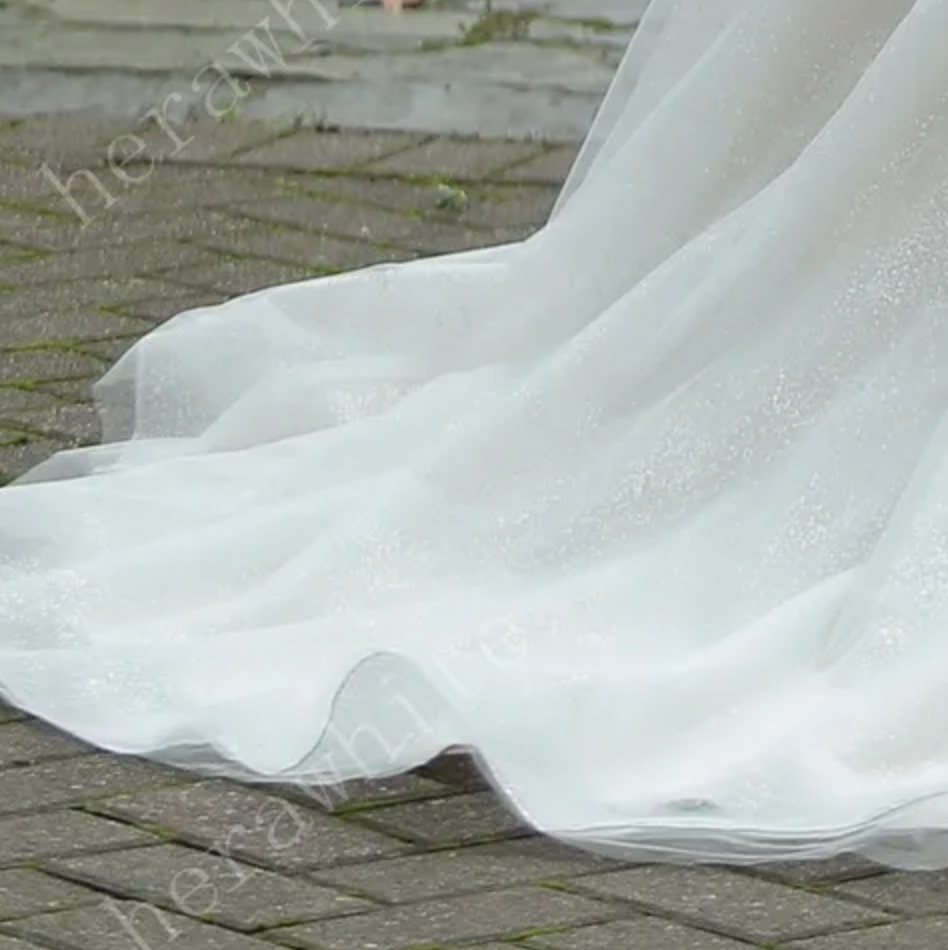 
                      
                        Elegant Floral Lace Wedding Dress with Off-Shoulder Straps
                      
                    