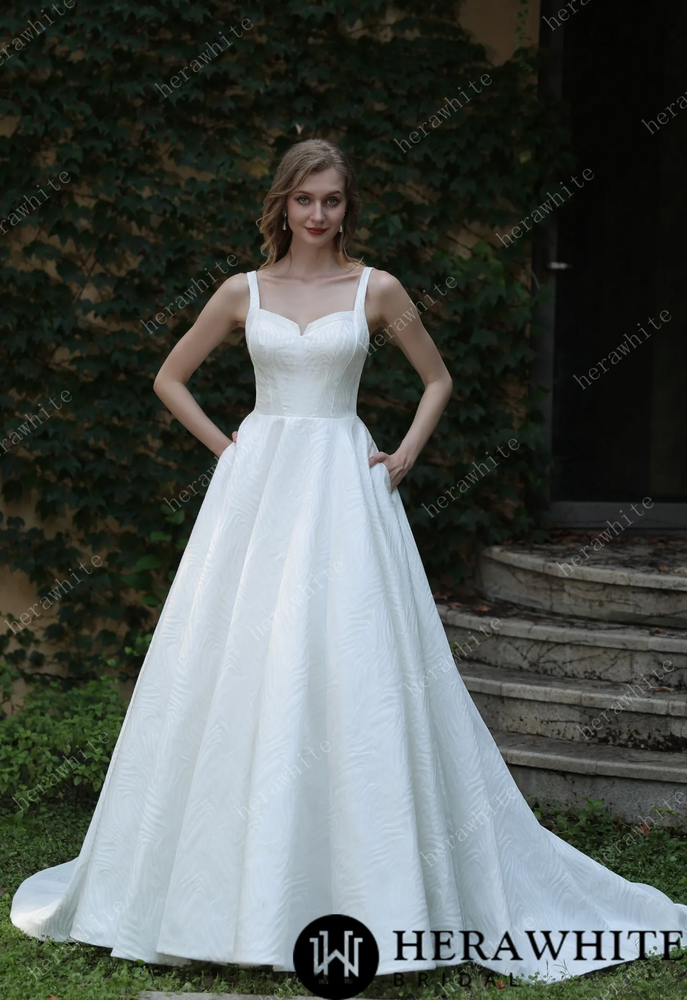 
                      
                        Minimalist Chic Modern Ballgown Wedding Dress With Shoulder Straps
                      
                    