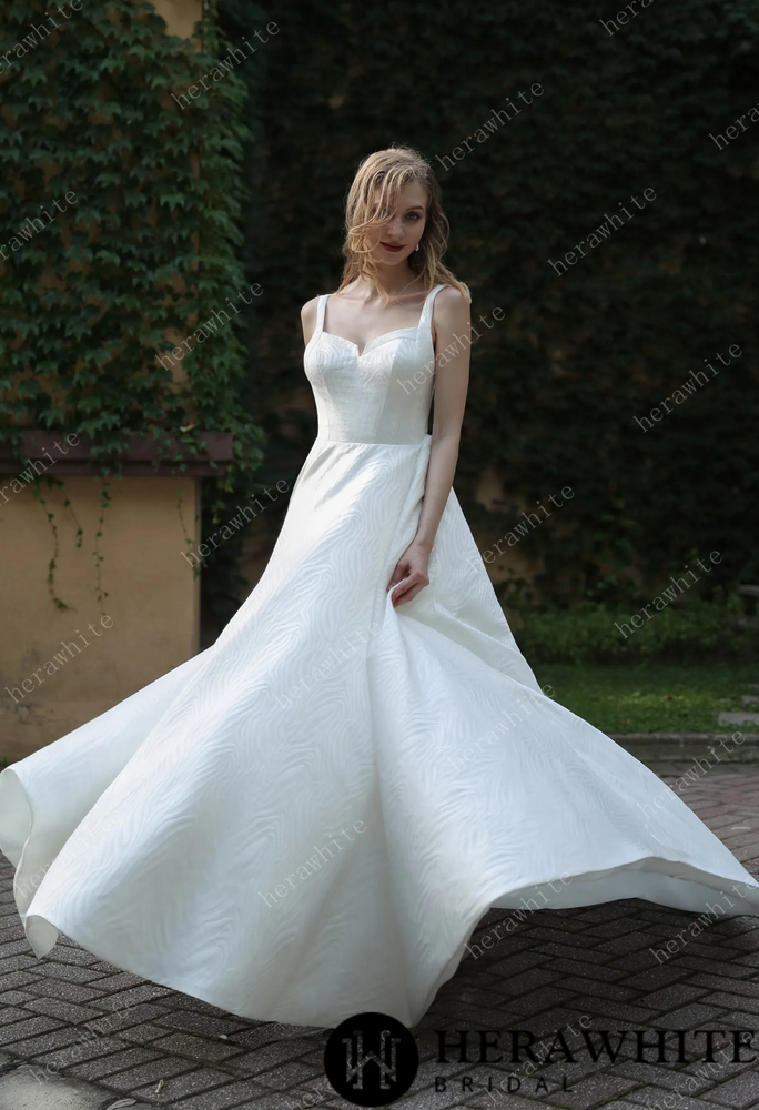 
                      
                        Minimalist Chic Modern Ballgown Wedding Dress With Shoulder Straps
                      
                    