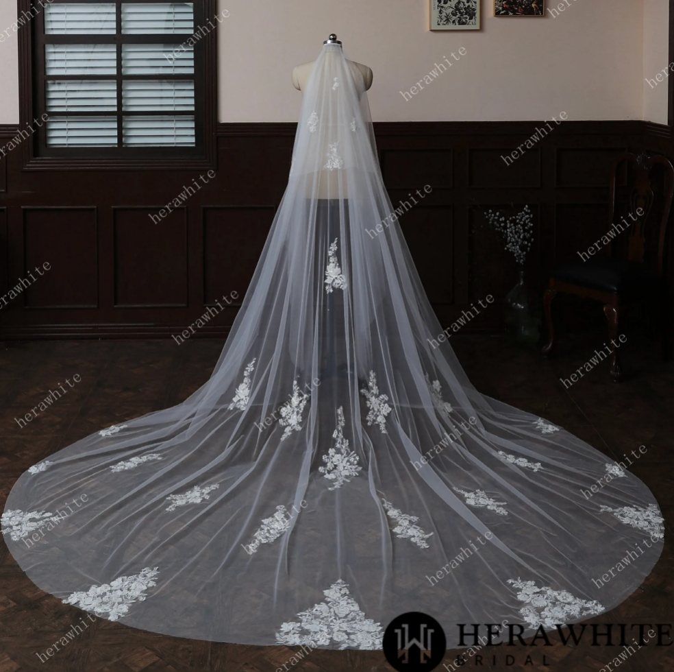 
                      
                        Waltz Length Wedding Veil With Romantic Lace Motifs
                      
                    