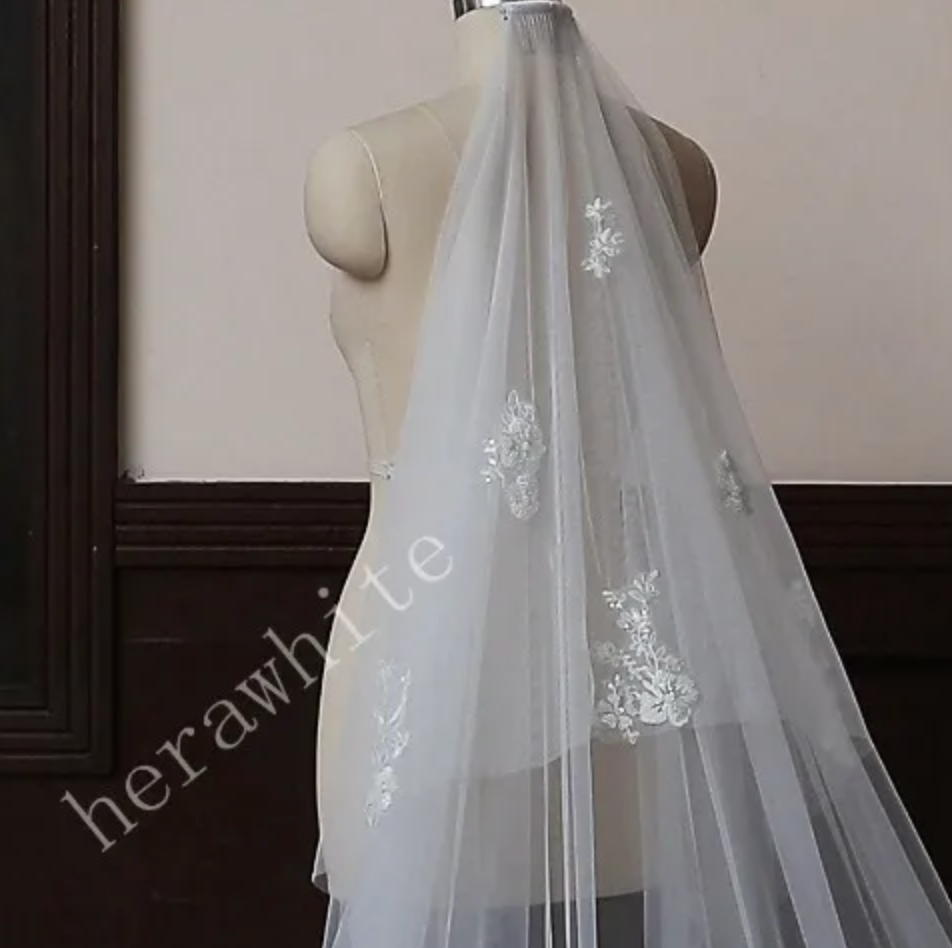 
                      
                        Waltz Length Wedding Veil With Romantic Lace Motifs
                      
                    