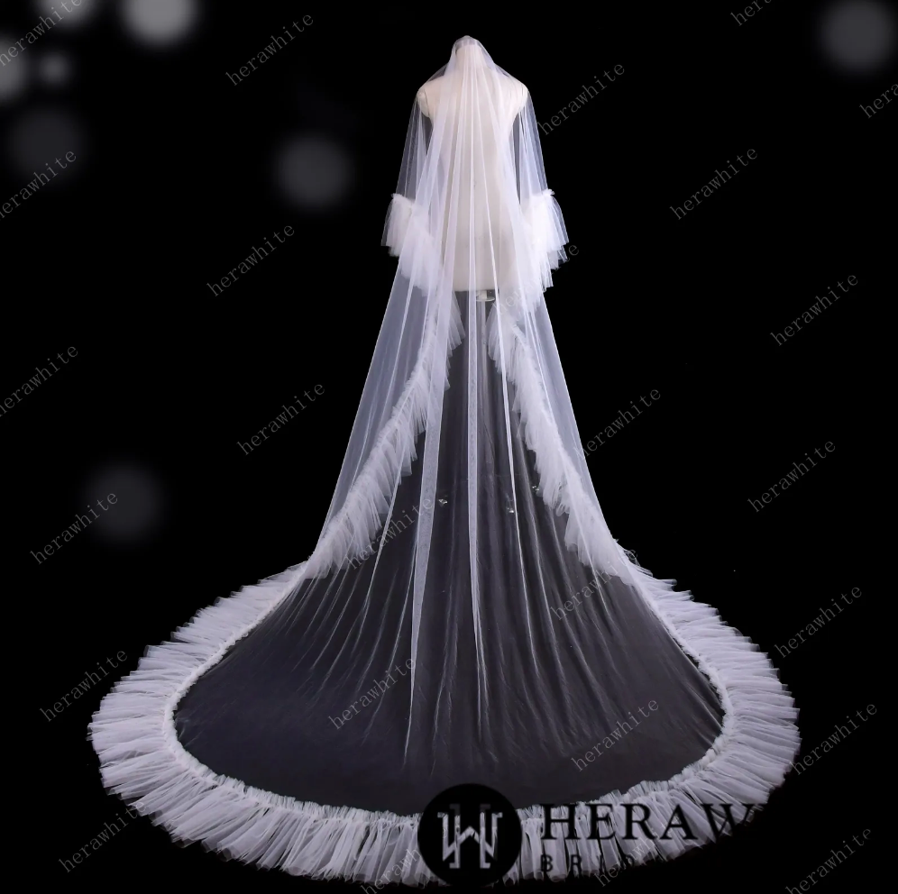 
                      
                        Two Tiered Cathedral Ruffle Veil Match to Your Hera White Gown
                      
                    