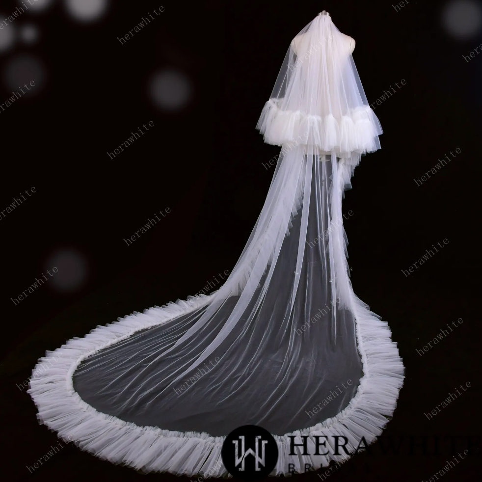 
                      
                        Two Tiered Cathedral Ruffle Veil Match to Your Hera White Gown
                      
                    