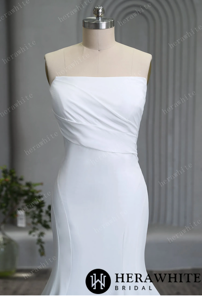 
                      
                        Graceful Strapless Pleated Crepe Wedding Gown
                      
                    