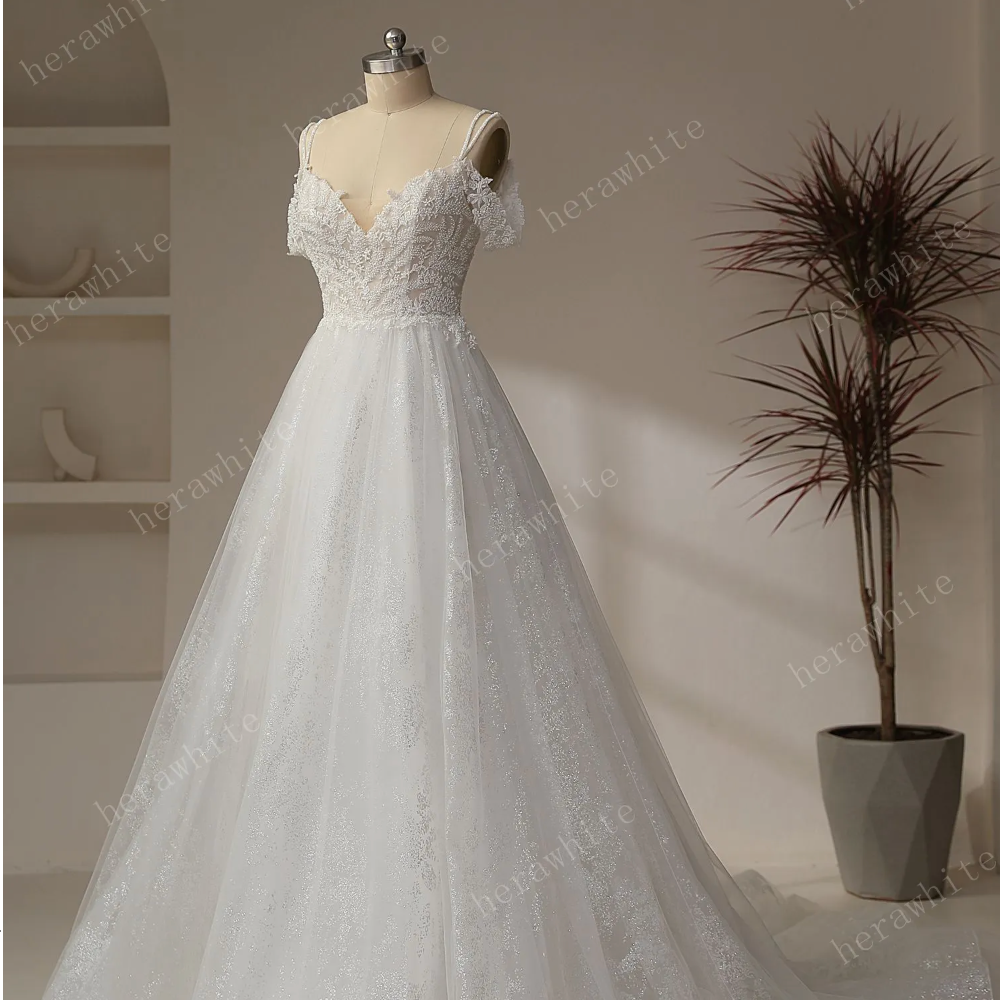 
                      
                        Beaded leaf lace Illusion Bodice With V-neckline Wedding Gown
                      
                    