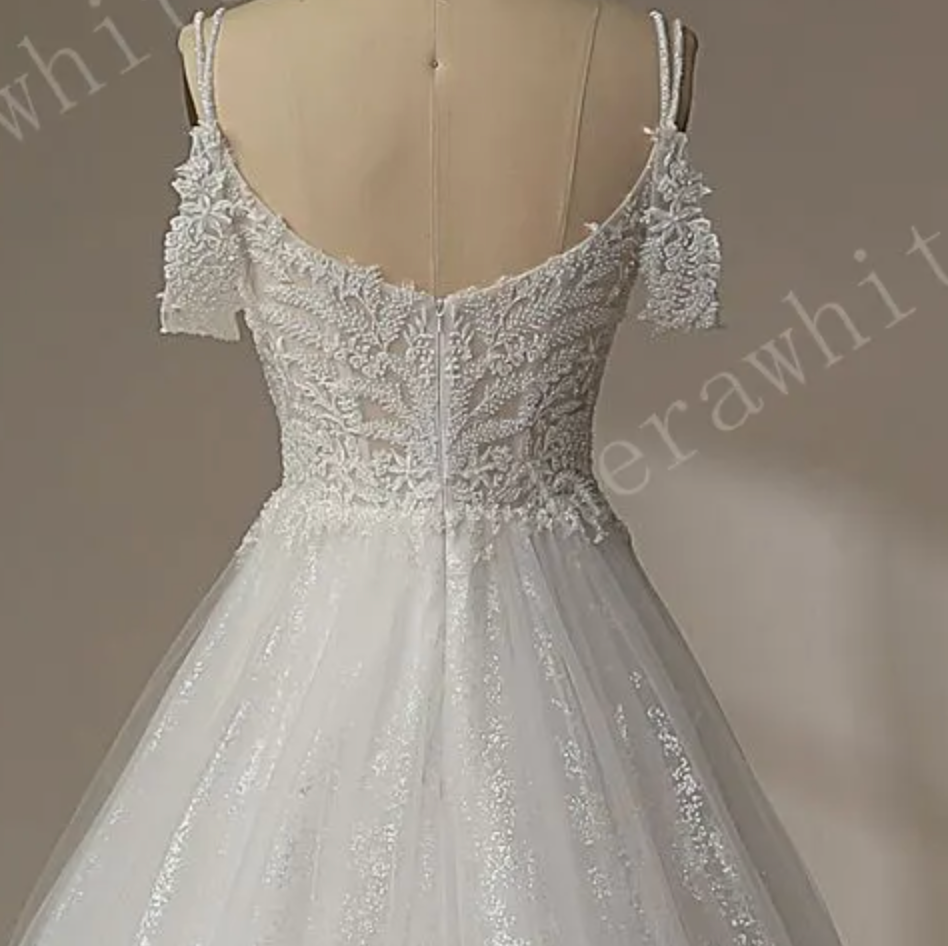 
                      
                        Beaded leaf lace Illusion Bodice With V-neckline Wedding Gown
                      
                    