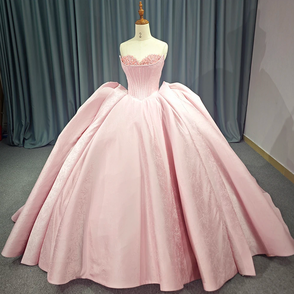 
                      
                        Pink Strapless Satin Quinceanera Dress
                      
                    